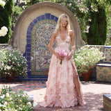 Vestido longo com decote halter e abertura