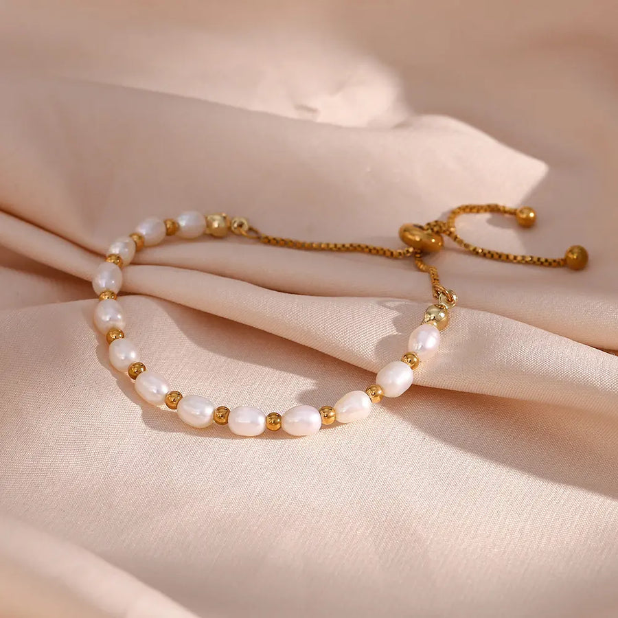 Pulseira Elegante com Pérolas e Dourado