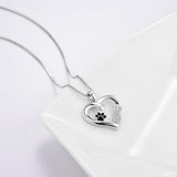 Collier patte et cœur avec breloque infini