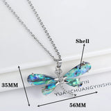 Collier pendentif papillon en coquillage naturel