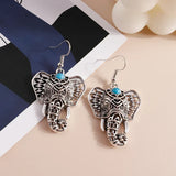 Boucles d'oreilles pendantes éléphant vintage argent style bohème