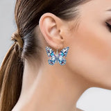 Boucles d'oreilles papillon scintillantes