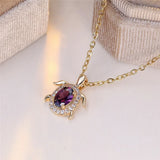 Collier pendentif tortue en cristal violet