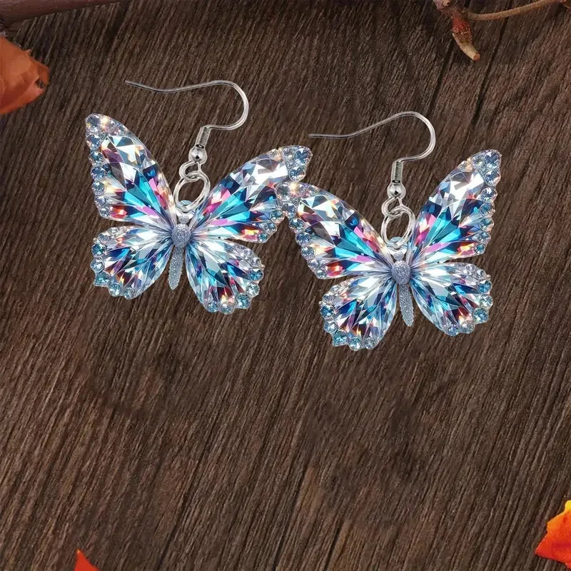 Boucles d'oreilles papillon scintillantes