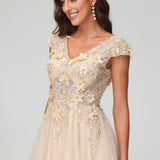 Clara | Vestido em tule transparente com aplicações florais com decote em V