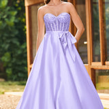 Bruna | Vestido comprido em cetim evasê com top em lantejoulas e decote coração