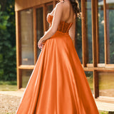 Bruna | Vestido comprido em cetim evasê com top em lantejoulas e decote coração