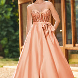 Bruna | Vestido comprido em cetim evasê com top em lantejoulas e decote coração