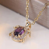 Collier pendentif tortue en cristal violet