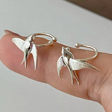 Magnifiques boucles d'oreilles clip hirondelle argentée