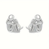 Boucles d'oreilles créoles bicolores argent et or