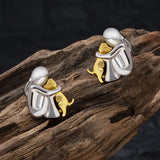 Boucles d'oreilles créoles bicolores argent et or