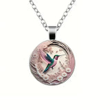 Collier pendentif dôme en verre Colibri