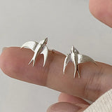 Magnifiques boucles d'oreilles clip hirondelle argentée