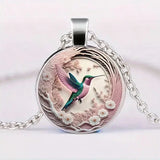 Collier pendentif dôme en verre Colibri