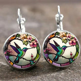 Collier pendentif dôme en verre Colibri