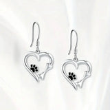 Boucles d'oreilles pendantes en argent avec motif cœur et patte