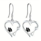 Boucles d'oreilles pendantes en argent avec motif cœur et patte