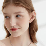 Boucles d'oreilles étreintes de chat bicolores argent et or
