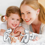 Boucles d'oreilles étreintes de chat bicolores argent et or