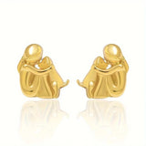 Boucles d'oreilles créoles bicolores argent et or