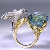 Anel Colibri Ajustável Cor Água-Marinha — Banho a Ouro 14K