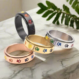Bague patte anti-stress tournante – Acier inoxydable avec pattes arc-en-ciel