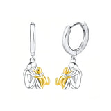 Boucles d'oreilles étreintes de chat bicolores argent et or
