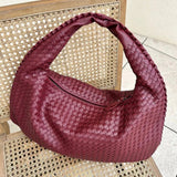 Mala hobo trançada elegante