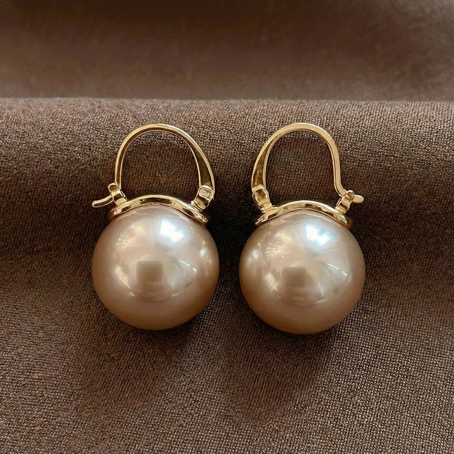 Brincos com Detalhe de Pérola