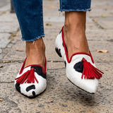 Genoveva | Mocassins Padrão Vaca Preto e Branco com Borlas Vermelhas