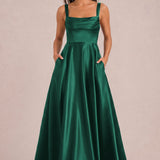 Pilar Verde Escuro | Vestido comprido evasê em cetim brilhante com bolsos